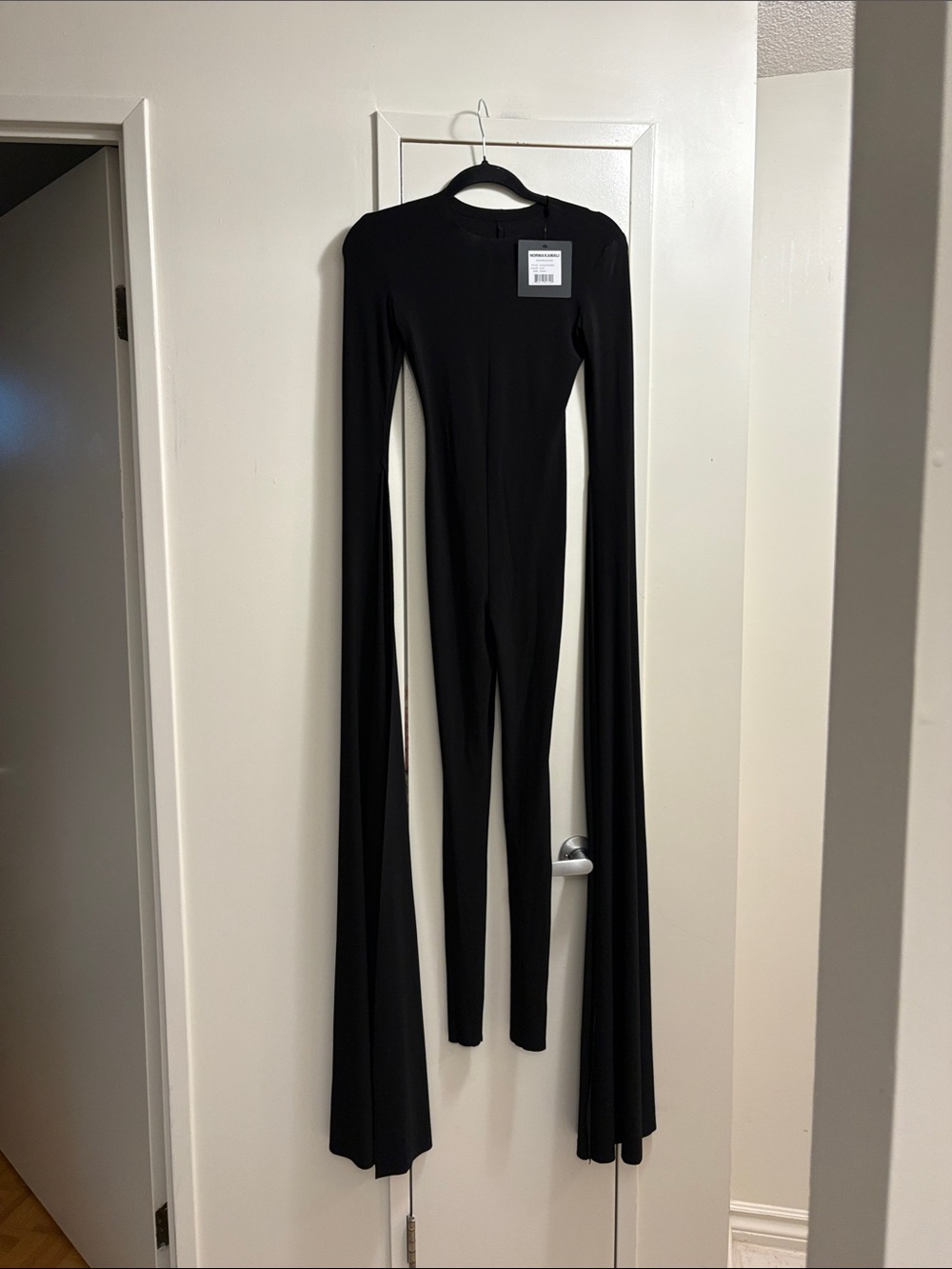 Norma Kamali Long Sleeve Black Jumpsuit with Dramatic Draped Scarf